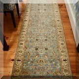D11. Mahal blue ground runner rug. Measures approx. 2'6” x 12' 